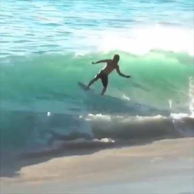 Surfer does an amazing trick