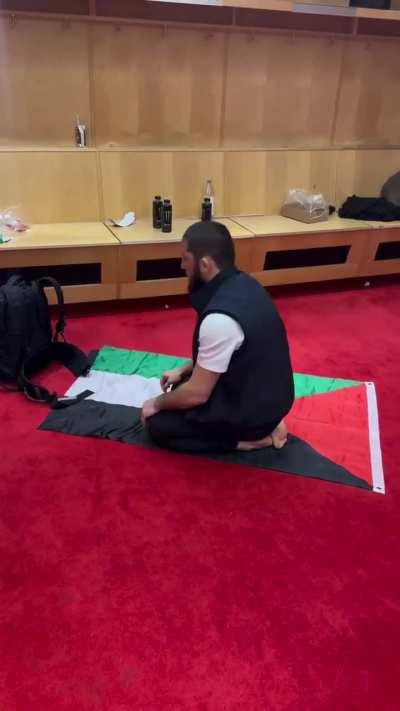 Pound 4 Pound King, Undisputed Lightweight Champion of the World, Islam Makhachev praying in the locker room just after victory.