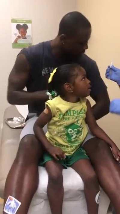 Dad pretending to be vaccinated helps with daughters confidence