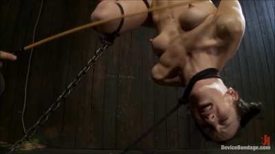 Elise Graves is hung upside down and caned all over