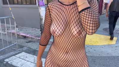 Wearing only a fishnet dress in public
