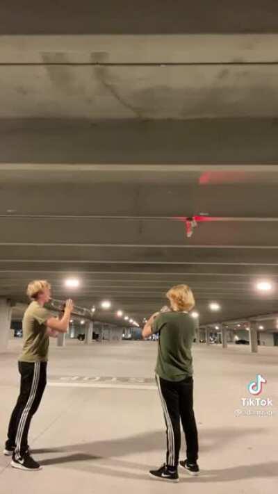 Trumpets playing Hallelujah in parking garage