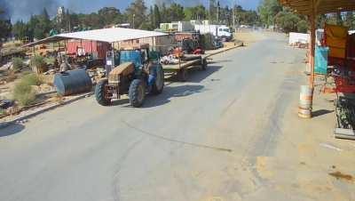 New footage from Kibbutz Be'eri showing Gazans looting agricultural equipment during the massacre on October 7th 2023 - security camera video: