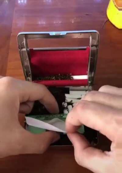 A cigarette rolling case