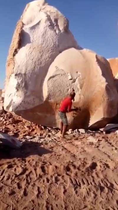 Splitting a giant rock 🪨