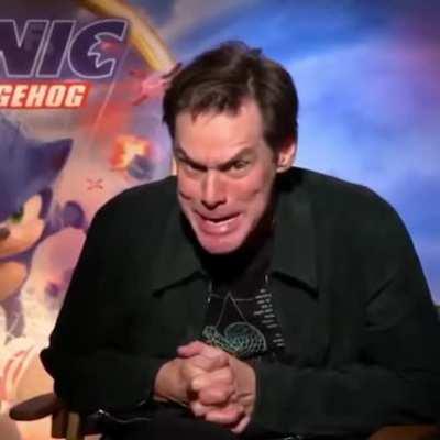 Jim Carrey showing his Grinch face