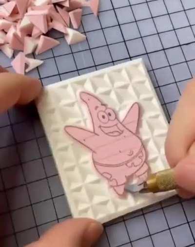 The process of making this linocut stamp.