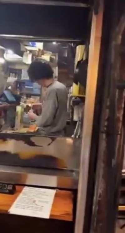 Omoide Yokocho is a narrow street in Tokyo with over 70 tiny bars and barbecue stands. It looks like it's straight out of 