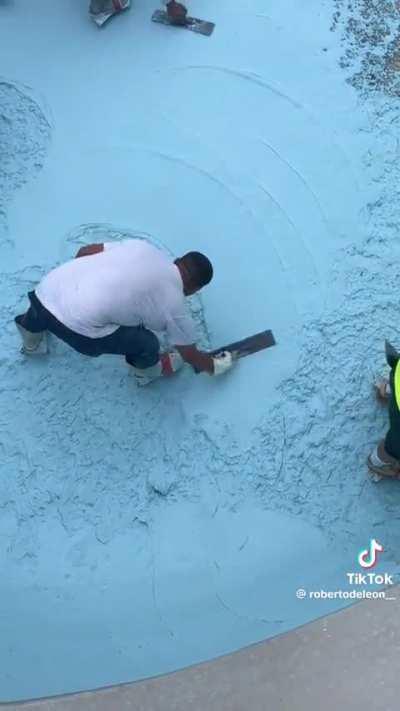 Applying pool coating 