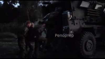 Russian POW loaded into a Ukrainian MRAP in Kursk