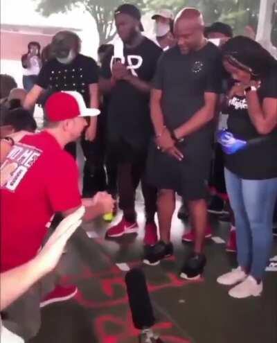 White neighborhood kneels to ask black community for forgiveness for years of Racism.