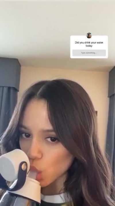 Jenna Ortega drinking her water