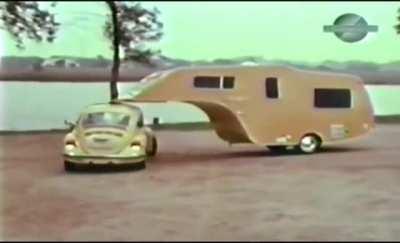 A 1974 Volkswagen and it's Fifth-Wheel travel trailer.