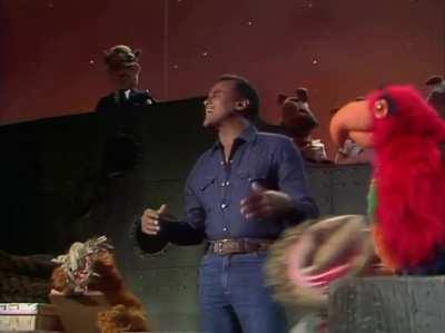 Harry Belafonte attempts to the sing &quot;The Banana Boat Song&quot; with Fozzie and the rest of the Muppets, in 1979