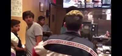 Kid doesn't wanna wait in line, tries out a little racism