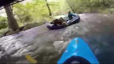 Two women fighting while river rafting