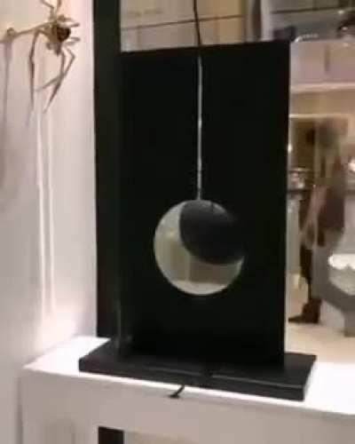 Pendulum and Light like a portal to another dimension.