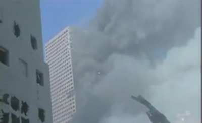 Rare video of WTC 7 burning a few hours after the collapse of WTC 1 and 2