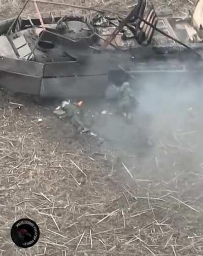 UA 1st Battalion, 93rd Mechanized Brigade's &quot;Black Raven&quot; drone unit spotted a pair of Russian infantrymen taking cover behind a disabled armored vehicle, striking them with a pair of FPV 'kamikaze' drones. Published May 3, 2024