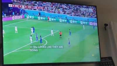 McKennie uses a photographer's bib to dry his hands before his throw in