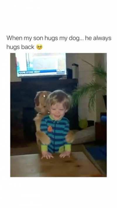 When this kid hugs the dog, the dog always hugs back