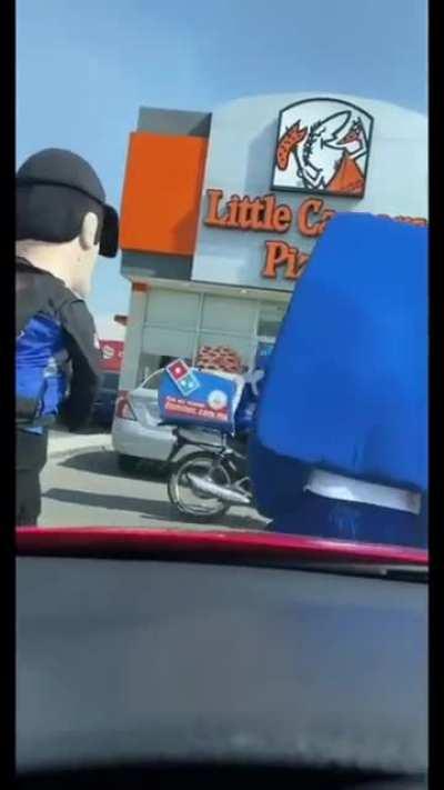 Dominos invade Little Caesars.