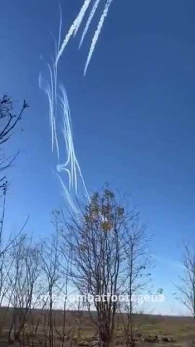 A pair of Ukrainian Su-25 attack aircraft fires unguided missiles at Russian positions. Zaporizhzhia region. Autumn 2023.