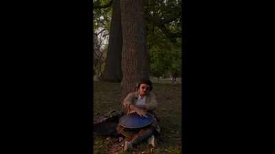 Playing a very satisfying melody on my handpan while enjoying the autumn sunset