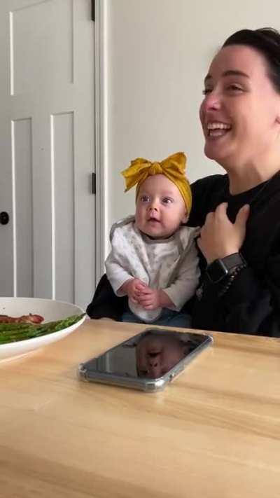 New mom can't control her emotions when her baby laughs for the first time