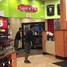 A guy flipping in a store