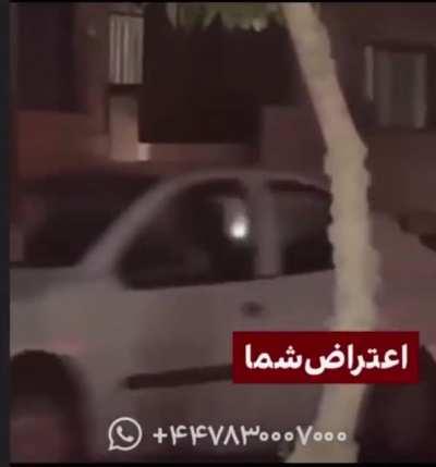 A college professor who stood against the Iranian police that was trying to arrest his female students for protesting against compulsory hijab was shot dead for “betraying Islamic law” as his wife hid and watched in a car nearby.