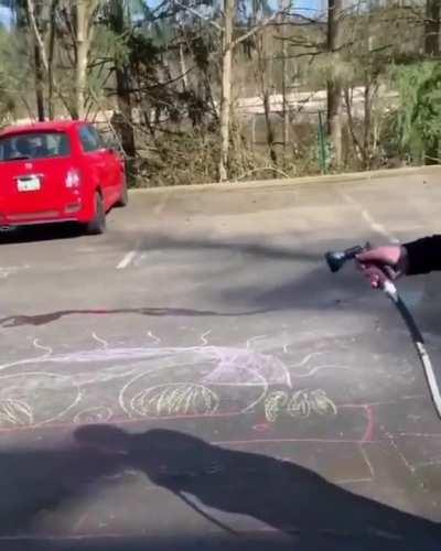 Karen destroys a child's chalk work