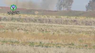 Interesting angle of an SAA tank taking at ATGM strike - Daraa Countryside - 1/24/2015