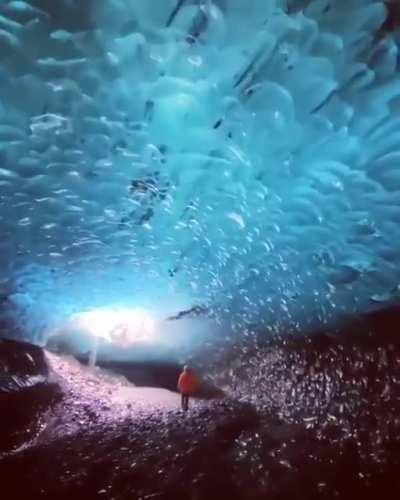 A cave below a frozen lake in Iceland