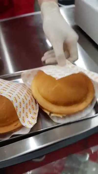 UFO burger made in a way that makes it not spill when you bite into it