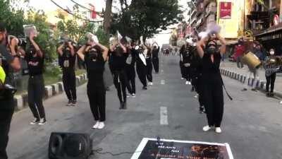 &quot;The Rapist is you &quot;women march on Kathmandu streets to protest rising rape incidents playing traditional music.