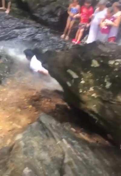 Falling down onto rocks