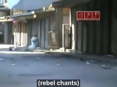 SAA shoot at unarmed rebels who are making fun of them. Homs 1/7/2011