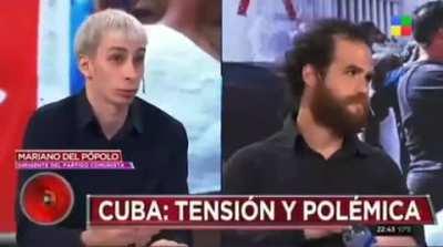 Un comunista tratando de explicarle a un cubano como se vive en Cuba