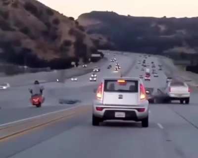 Instant mayhem! Who’s at fault here? Biker or the car? 