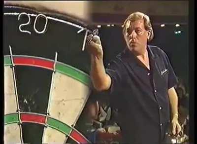 With the eyes of a sniper, hands of a surgeon, and body of Homer Simpson; John Lowe wins £102,000 after hitting the first televised nine-darter in professional darts history (1984)