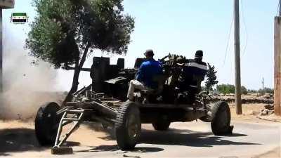 Syrian Revolutionaries Front fighters set up a 57mm AZP S-60 AA gun to target IS positions - Yarmouk Basin - 7/10/2016