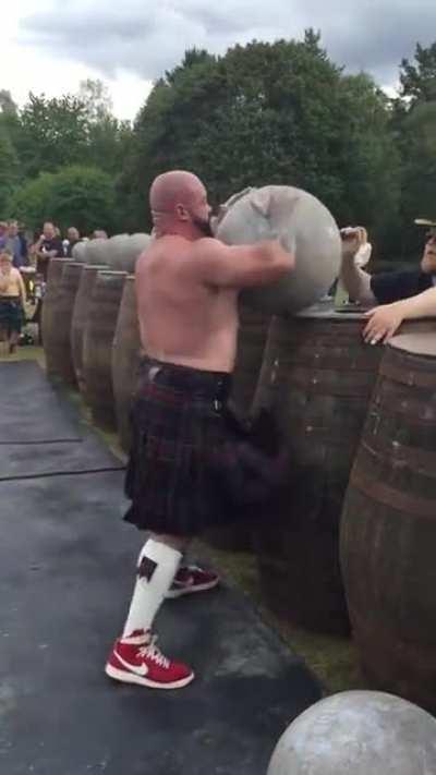 Andrew Cairney from Glasglow, Scotland loading all nine of The Ardblair Stones