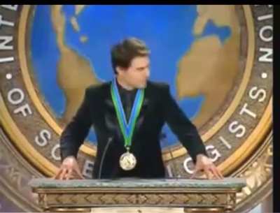 Tom Cruise saluting Scientology founder L Ron Hubbard.