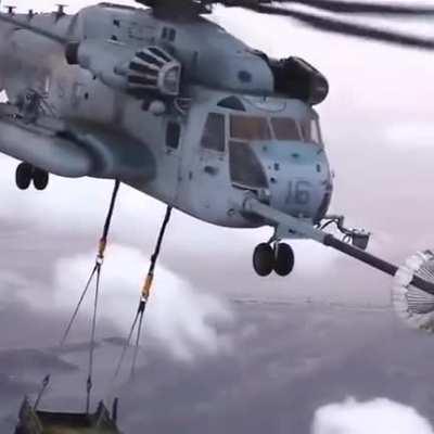 CH-53 Sea Stallion conducting areal refueling while carrying a Humvee [video]