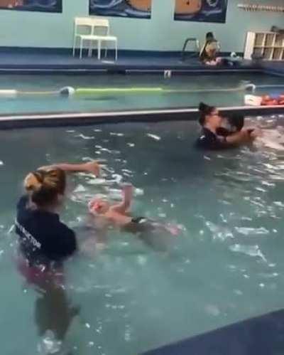 Teaching babies to swim. Human babies naturally hold their breath when underwater