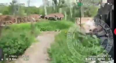 A Russian soldier shoots what looks like a VOG-17 grenade towards a Ukrainian position with a bow and arrow. Luhansk Oblast