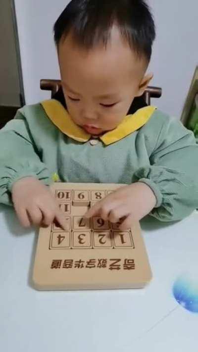 Little man doing this puzzle