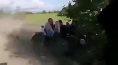 WCGW pulling a motorcycle with sidecar with three people aboard