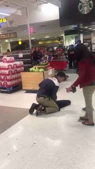 Racist lady hurls items and racial slurs at people at Target and gets taken down by security